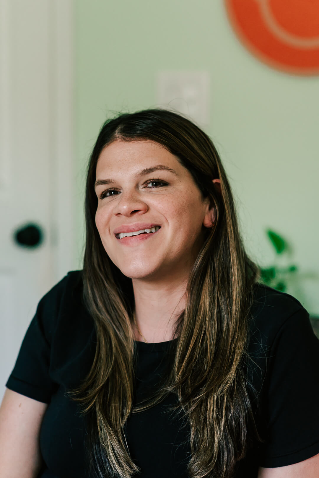 Headshot of Abby Heit wearing a black tshirt, a northern virginia perinatal therapist